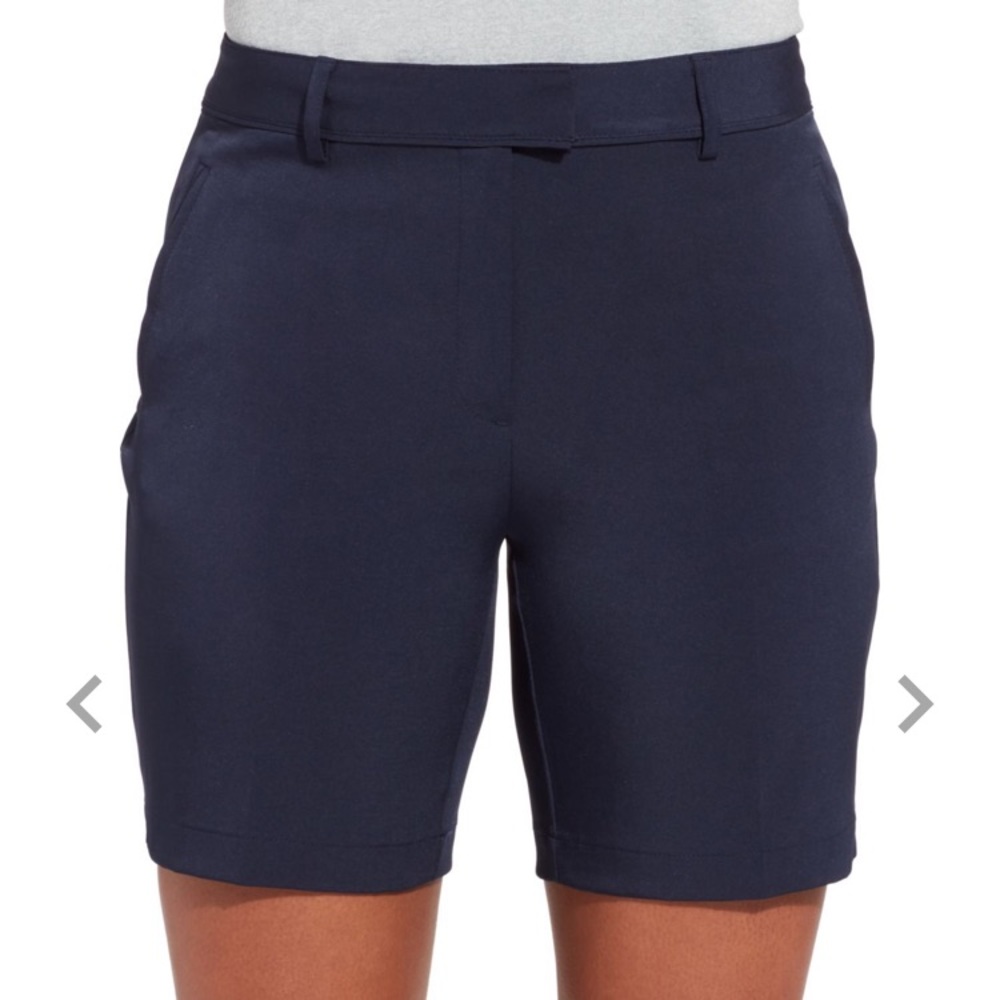 Lady Hagen black golf shorts.